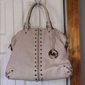Gold stud lined white Michael Kors bag
